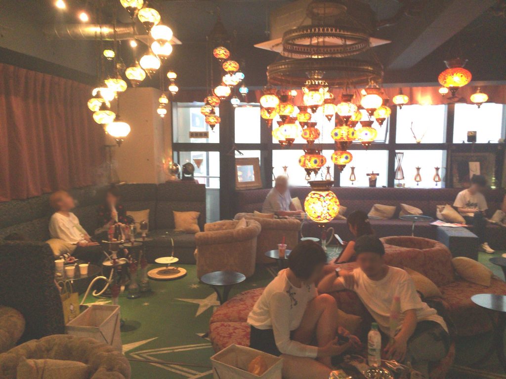 people enjoy smoking hookah at a shisha lounge in shibuya